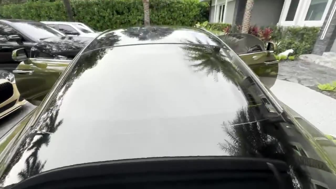 Tinted automotive glass on a luxury coupe
