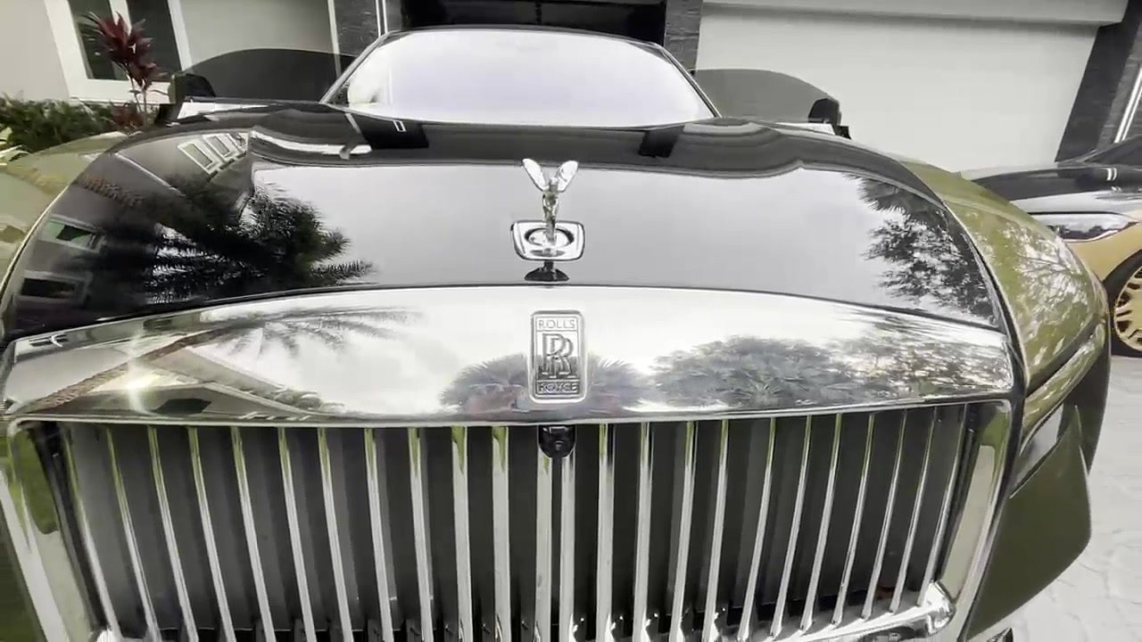 Close-up of a chrome grille and hood ornament