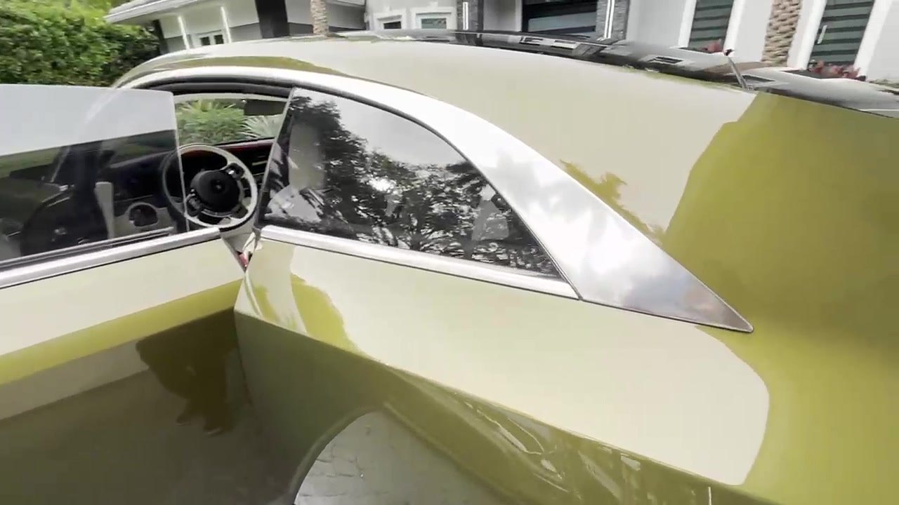 Rear quarter glass on a luxury coupe, used to preview tint shade levels